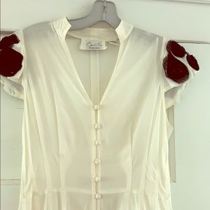 Cream vintage feel dress, black roses on sleeves